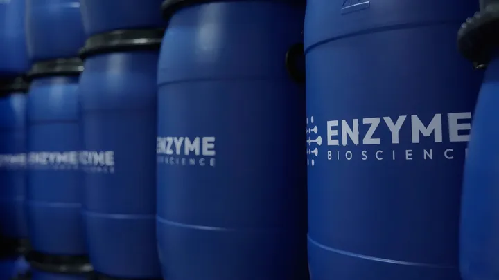 Enzyme Bioscience branded HDPE drums ready for dispatch